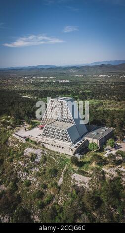 Aerial view of the The Temple of Monte Grisa, Roman-Catholic church north of the city of Trieste, Located at an altitude of 300 metres on the edge of Stock Photo
