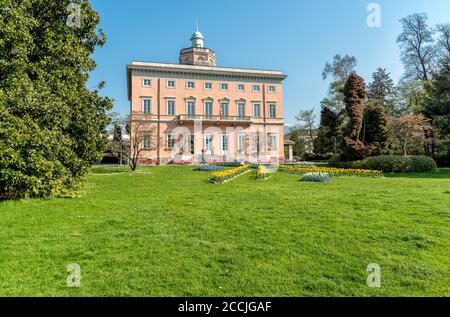 View of Villa Ciani with colorful tulips foreground in the public city park of Lugano, Switzerland Stock Photo