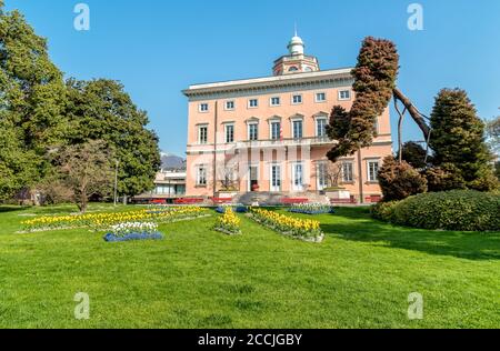 View of Villa Ciani with colorful tulips foreground in the public city park of Lugano, Switzerland Stock Photo