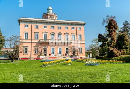 View of Villa Ciani with colorful tulips foreground in the public city park of Lugano, Switzerland Stock Photo