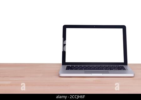 Computer notebook laptop with blank white screen monitor on wood table, Isolated on white background with clipping path Stock Photo