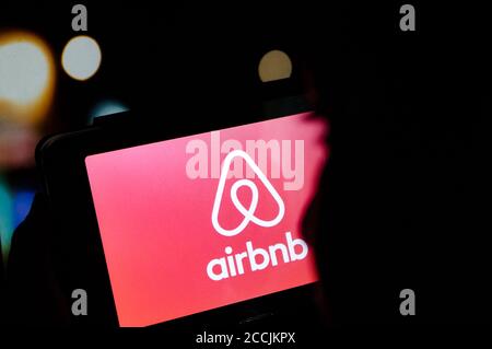Makassar, South Sulawesi, Indonesia. 23rd Aug, 2020. Photo illustration - A person holding a smartphone with the AIRBNB logo on the screen. Credit: Herwin Bahar/ZUMA Wire/Alamy Live News Stock Photo