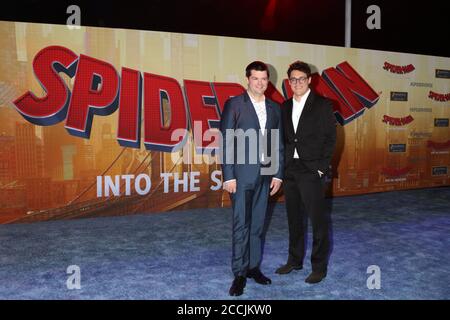 LOS ANGELES - DEC 1:  Christopher Miller, Phil Lord at the Spider-Man:  Into the Spider-Verse Premiere at the Village Theater on December 1, 2018 in Westwood, CA Stock Photo