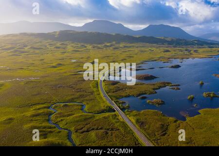 Aerial view of Lochan na h-Achlaise and A82 road crossing Rannoch Moor in summer, Scotland, UK Stock Photo