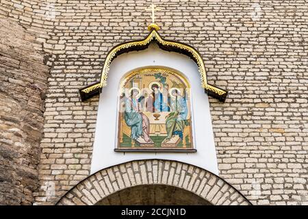 Holy Trinity mosaic on the main gate of the Pskov Kremlin or Pskov Krom, Russia Stock Photo