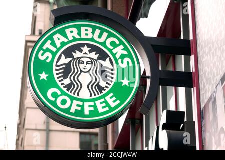 Prague, Czech Republic - December 24, 2012. Starbucks coffee logo. Starbucks Coffee is an American chain of coffee shops, founded in Seattle. Stock Photo