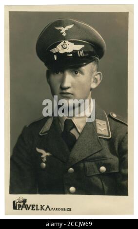 German historical photo: young handsome man, Unterfeldwebel of air force (Luftwaffe) in military uniform, Pardubice, occupied Czechia, Germany, 1941 Stock Photo