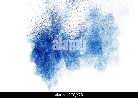 Blue color powder explosion on white background. Stock Photo