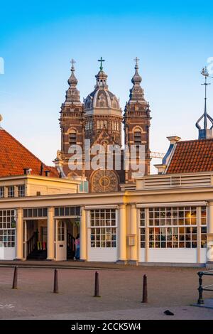 Netherlands, North Holland, Amsterdam, Street in front of Basilica of Saint Nicholas Stock Photo