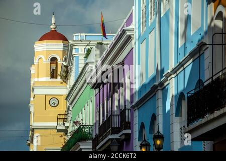 City Hall bell tower and colorful Spanish Colonial buildings, San Francisco St., Old San Juan, Puerto Rico Stock Photo