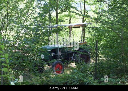 old tractor still in use Stock Photo