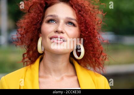 Beatiful woman with red curly hair, portrait Stock Photo