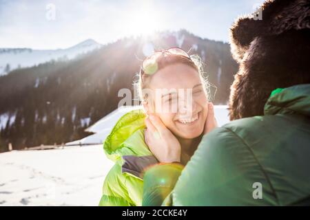 Happy affectionate couple in winter landscape, Achenkirch, Austria Stock Photo