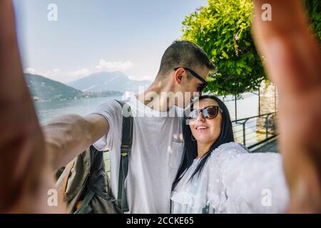 Happy young couple taking a selfie