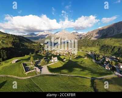 Switzerland, Canton of Grisons, Arosa, Aerial view of mountain resort town in summer Stock Photo