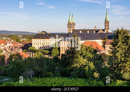 Germany, Bavaria, Bamberg, Bamberg Cathedral and surrounding old town buildings at dusk Stock Photo