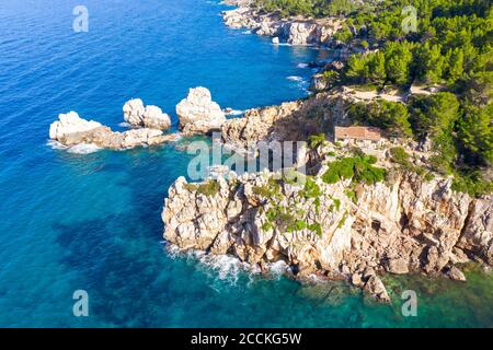 Spain, Mallorca, Deia, Drone view of coastal cliffs in Serra de Tramuntana Stock Photo