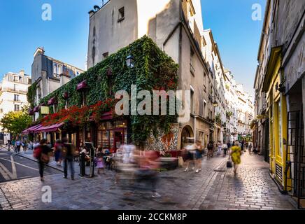 Tourists on street in Paris, France Stock Photo