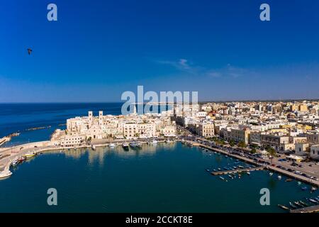 Italy, Province of Bari, Molfetta, Drone view of old town marina in summer Stock Photo