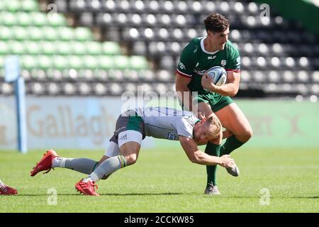 Twickenham, UK. 23rd Aug, 2020. Ross Neal of London Irish is tackled by Rory Hutchinson of Northampton Saints during the Gallagher Premiership Rugby match between London Irish and Northampton Saints at Twickenham Stoop, Twickenham, England on 22 August 2020. Photo by Ken Sparks. Editorial use only, license required for commercial use. No use in betting, games or a single club/league/player publications. Credit: UK Sports Pics Ltd/Alamy Live News Stock Photo