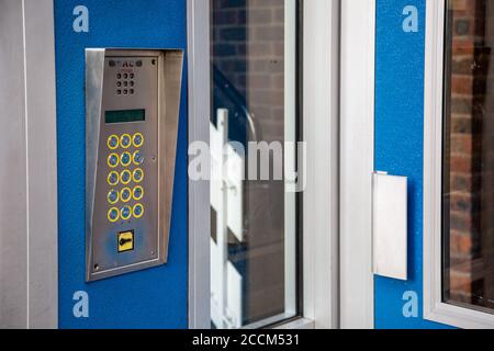 A intercom system on the exterior of a block of flats used for gaining access Stock Photo