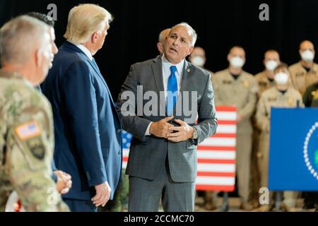 Yuma, United States Of America. 18th Aug, 2020. President Donald J. Trump listens as Acting Commissioner of Customs and Border Protection Mark Morgan delivers remarks during an update on border wall construction operations Tuesday, Aug. 18, 2020, in the Joe Foss Hangar in Yuma, Ariz. People: President Donald Trump Credit: Storms Media Group/Alamy Live News Stock Photo