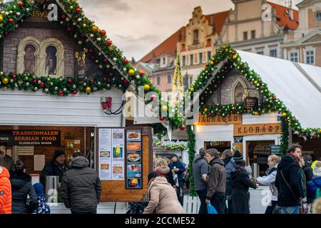 PRAGUE, CZECH REPUBLIC - DECEMBER 17, 2017; Busy Christmas market food stalls in the center of Prague few days before Christmas. Prague is a popular E Stock Photo