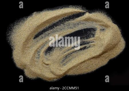 Brown sand on black background Stock Photo