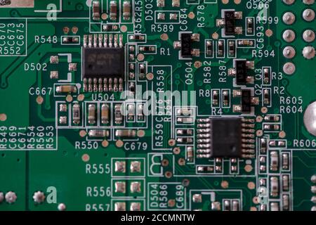 Close-up of electronic components. SMD resistors, capacitors and integrated circuits. Stock Photo