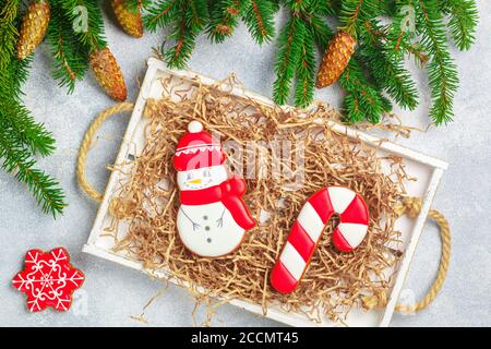 Gingerbread. Traditional new Year and Christmas treats. Cookies in the form of snowflakes, snowman and canes. The concept of the celebration. Holidays Stock Photo