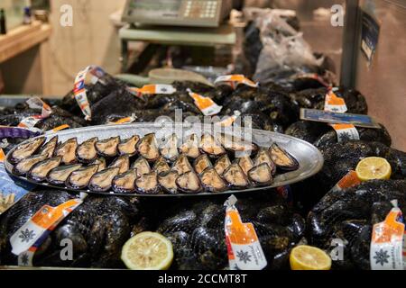 Platters with raw mussels seafood at sardinian fish market Stock Photo
