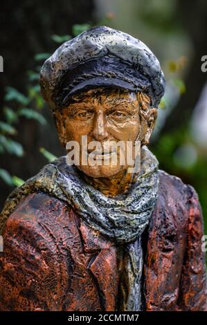 Odessa, Ukraine - 3, OCTOBER, 2010: Gipseous sculpture. Hero of novel 'Twelve Chairs' by Ilf & Petrov. Deribasovskaya street. City garden. Stock Photo