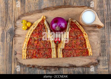 Traditional Turkish Cuisine; pide with cubed meat / kusbasili pide.Turkish pita concept Stock Photo