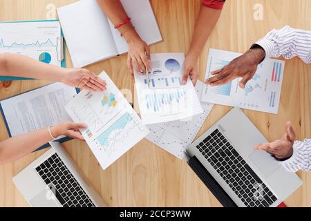 Managers analyzing reports Stock Photo