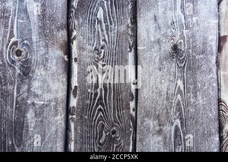 battered wood dark gray. grunge background. Rustic grey wood background. vertical beams. Stock Photo