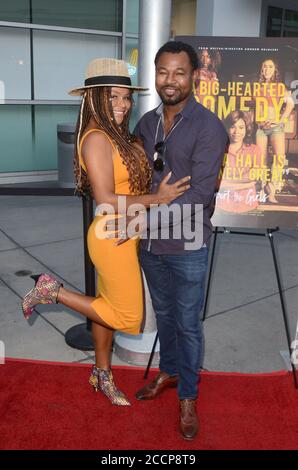 LOS ANGELES - AUG 22:  Trista Pisani, Sugar Shane Mosley at the Support the Girls Los Angeles Premiere at the ArcLight Theater on August 22, 2018 in Los Angeles, CA Stock Photo