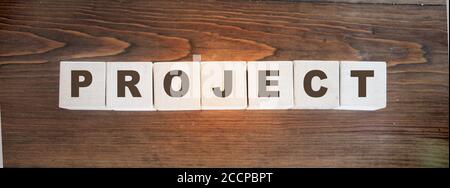 Project word letters on wooden blocks on table. Business Risk management concept Stock Photo