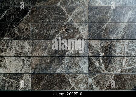 Marble natural texture background. Marble stone slabs lie in a row. Stock Photo