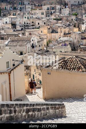 Exploring the old Sassi district in the town of Matera,  Basilicata, Southern Italy Stock Photo