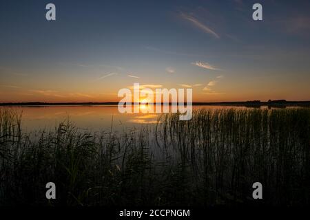 Picturesque sunset over the lake Stock Photo