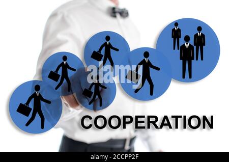 Cooperation concept shown by a man in background Stock Photo