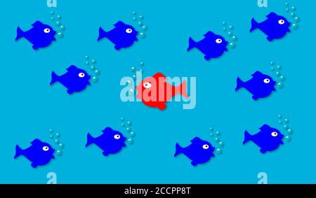 Red fish swimming in the opposite direction to all other fishes. Concept of thinking differently and individuality Stock Photo