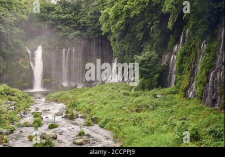 Rainy day at Shiraito Falls, a waterfall near Mount Fuji, Japan. Stock Photo