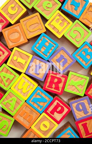 Colourful wooden ABC alphabet baby development blocks Stock Photo