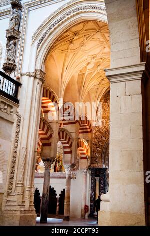 Alternating voussoirs at the Great Mosque of Cordoba in Spain and multi-foil arched entrances, Cordoba. Stock Photo
