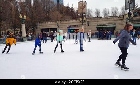 Ice skaters on the Millennium Park Ice Rink, Chicago Illinois, United States Stock Photo