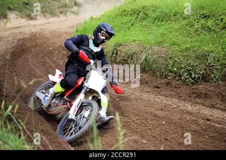 Motocrosser in action Stock Photo