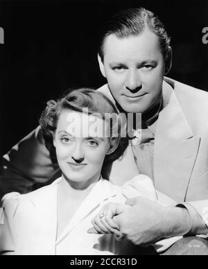 BETTE DAVIS and HERBERT MARSHALL Publicity Portrait for THE LETTER 1940 director WILLIAM WYLER play W. Somerset Maugham screenplay Howard Koch Warner Bros. Stock Photo