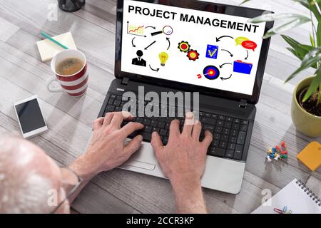 Project management concept shown on a laptop used by a man Stock Photo