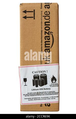 Caution Lithium ION Battery do not load or transport if damaged sticker label on parcel from Amazon isolated on white background Stock Photo